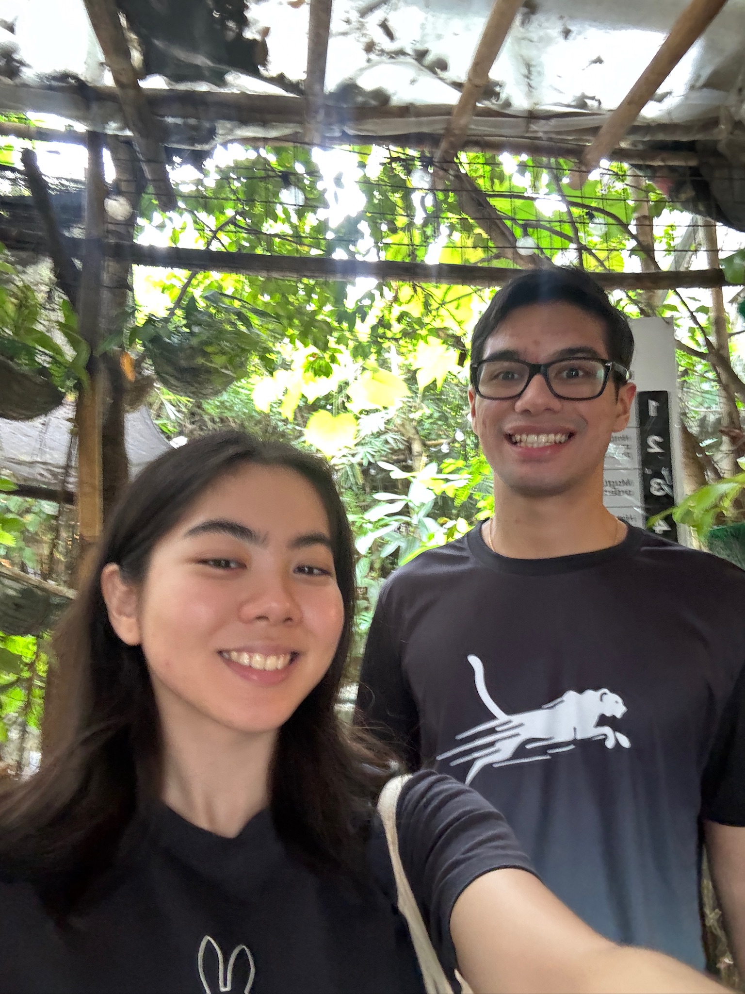 Pia and Zach taking an outdoor selfie together